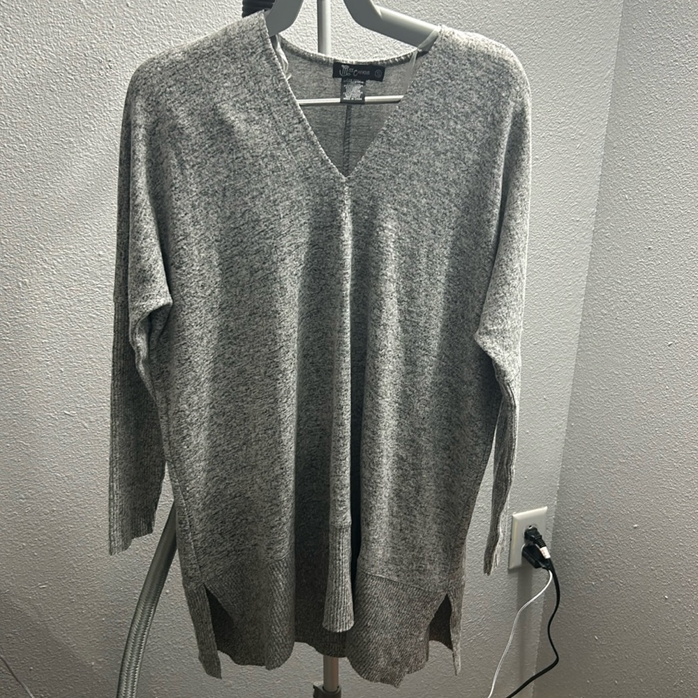 Miss Chevious size small sweater.
